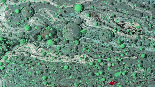 Top view Bright Collors Bubbles Slow Motion Oil Ink is fantastic structure of colorful chaotic motion bubbles stock video is a beautiful, unique, organic.