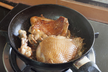 Fried Chicken Steak with Black Frying Pan.