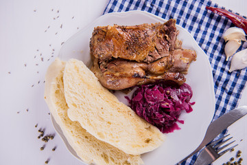 roast crispy duck wit red cabbage and dumplings eastern central european traditional rustic recipe 