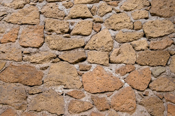 Natural stone wall textured background.