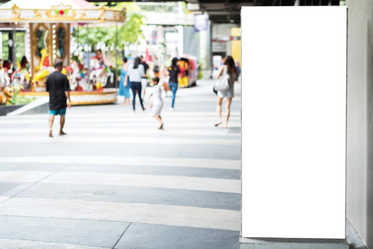 Blank advertising billboard with copy space for text, image and content at open air shopping mall.