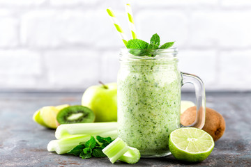 green smoothie with celery, apple, kiwi and lime. healthy diet eating, superfood
