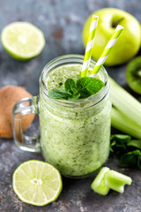 green smoothie with celery, apple, kiwi and lime. healthy diet eating, superfood