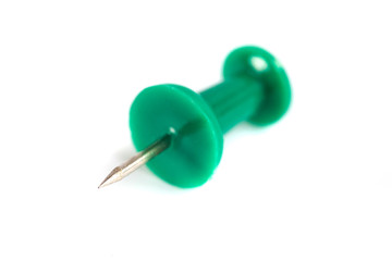 green push-pin isolated on the white background