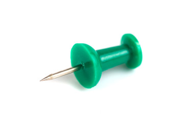 green push-pin isolated on the white background