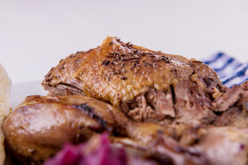 roast crispy duck wit red cabbage and dumplings eastern central european traditional rustic recipe 