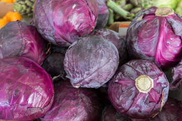 Fototapeta na wymiar Rurple red organic cabbage sold at farmers market