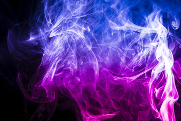 Colored smoke on black background