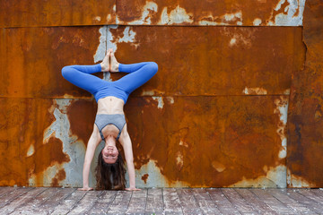 girl doing handstand