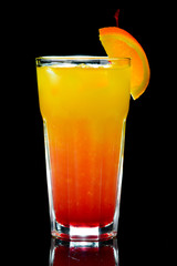 alcoholic cocktail on a black background with insulation