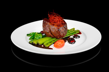 Filet Mignon on a black background