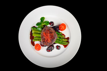 Filet Mignon on a black background