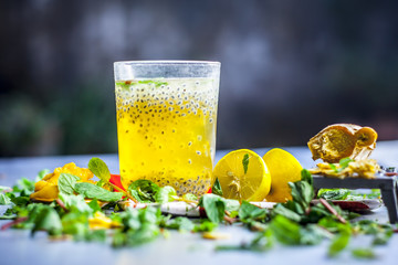 Close up of INDIAN popular summer drink JAGGERY SHRABAT/gud ka shrabat with all its ingredients...