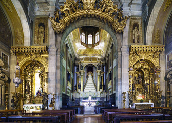 Fototapeta na wymiar Porto, Portugal. August 12, 2017: Interior of Saint Anthony's Church Congregates built in the eighteenth century and very polychrome, detail of the high altar