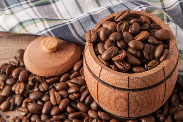 Fototapeta premium a barrel and coffee and a colored napkin
