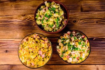 Different festive dishes on a wooden table