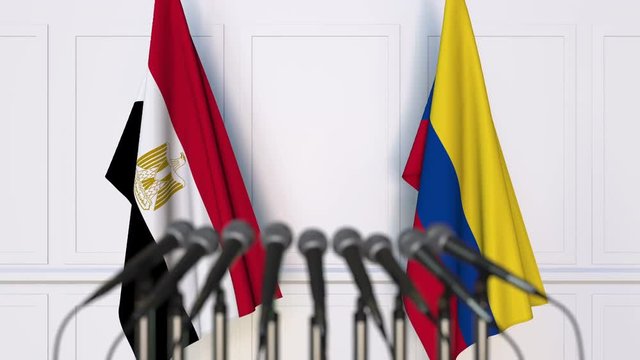 Flags of Egypt and Colombia at international meeting or negotiations press conference