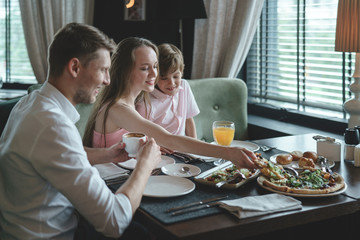 Happy family having lunch