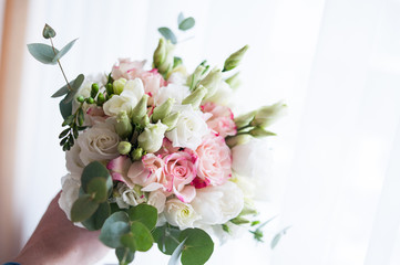 Wedding bouquet from fresh spring flowers. 