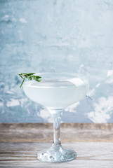Tasty cocktail with rosemary. Shallow depth of field. Selective focus.