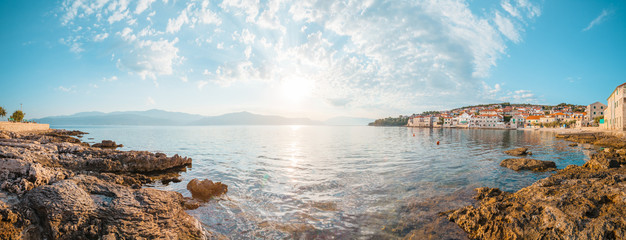Panoramic scenery of a beautiful beach of a small town Postira - Croatia, island Brac