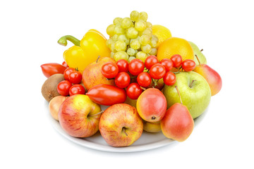Fruits and vegetables on a platter isolated on white background.