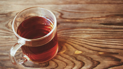 Top view of tea on wooden plank table