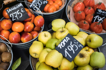 Arranged buckets with fresh apples