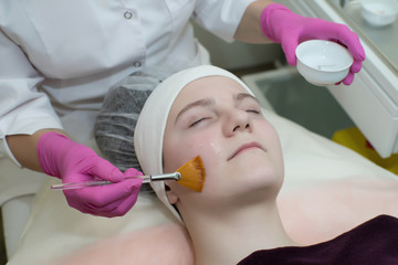 Naklejka premium Cosmetology, face peeling.
