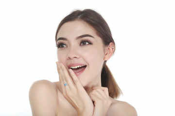 Fototapeta premium Charming beautiful face woman with perfect skin portrait present skincare concept, beauty spa and cosmetics image two hand touch face skin with treatment cream gel.