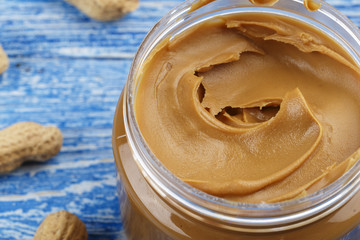 peanut paste on a wooden background
