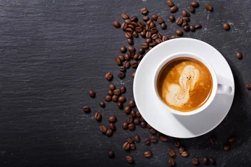Foto op Plexiglas cup of coffee on a dark table © Nitr