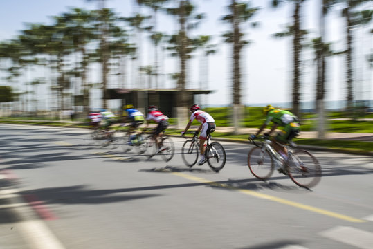 Competition cycling race on the road. Motion blur photo