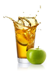 Fototapeta na wymiar glass of splashing apple juice