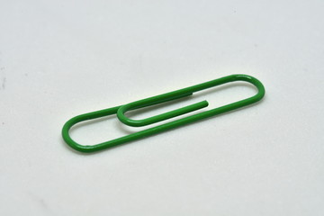 Usual office green paper clip