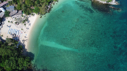 Aerail drone view of beautiful tropical beach and sea water