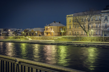 Cityscape of Nis and Nisava river in a winter nigh