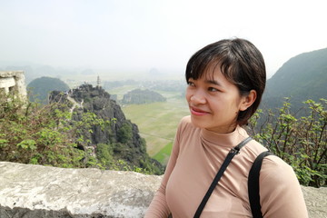 Naklejka premium The woman traveling in Hang Mua,Tam coc, Ninh Binh,Vietnam