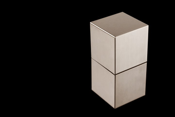 Metal grey cube on a black background abstract geometric shape