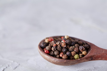 Seasoning - four kinds of pepper peas - isolated on white background