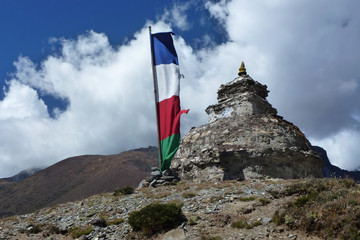 Ancient stupa in Dingboche, with prayer flags, Everest Base Camp trek, Nepal