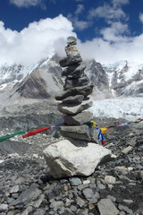 Pika (piled stones) with prayer flags at the EBC, Everest Base Camp trek, Nepal