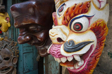 Wooden mask for sale at a street market Kathmandu, Nepal