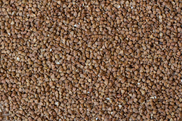 Buckwheat. Buckwheat on wood background and burlap top view