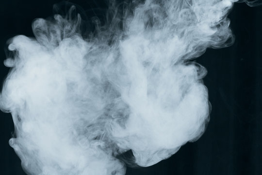 Texture of white smoke on a black background