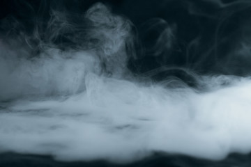 Texture of white smoke on a black background