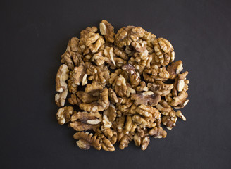 Walnuts on a black background
