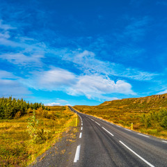 Isolated road and Icelandic colorful landscape at Iceland,