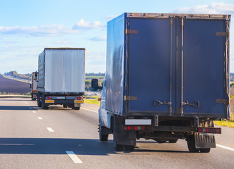 trucks move on  mountain road