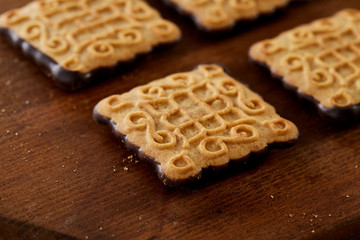 Top view close-up picture of tasty cookies on the cutting board, shallow depth of field, selective focus